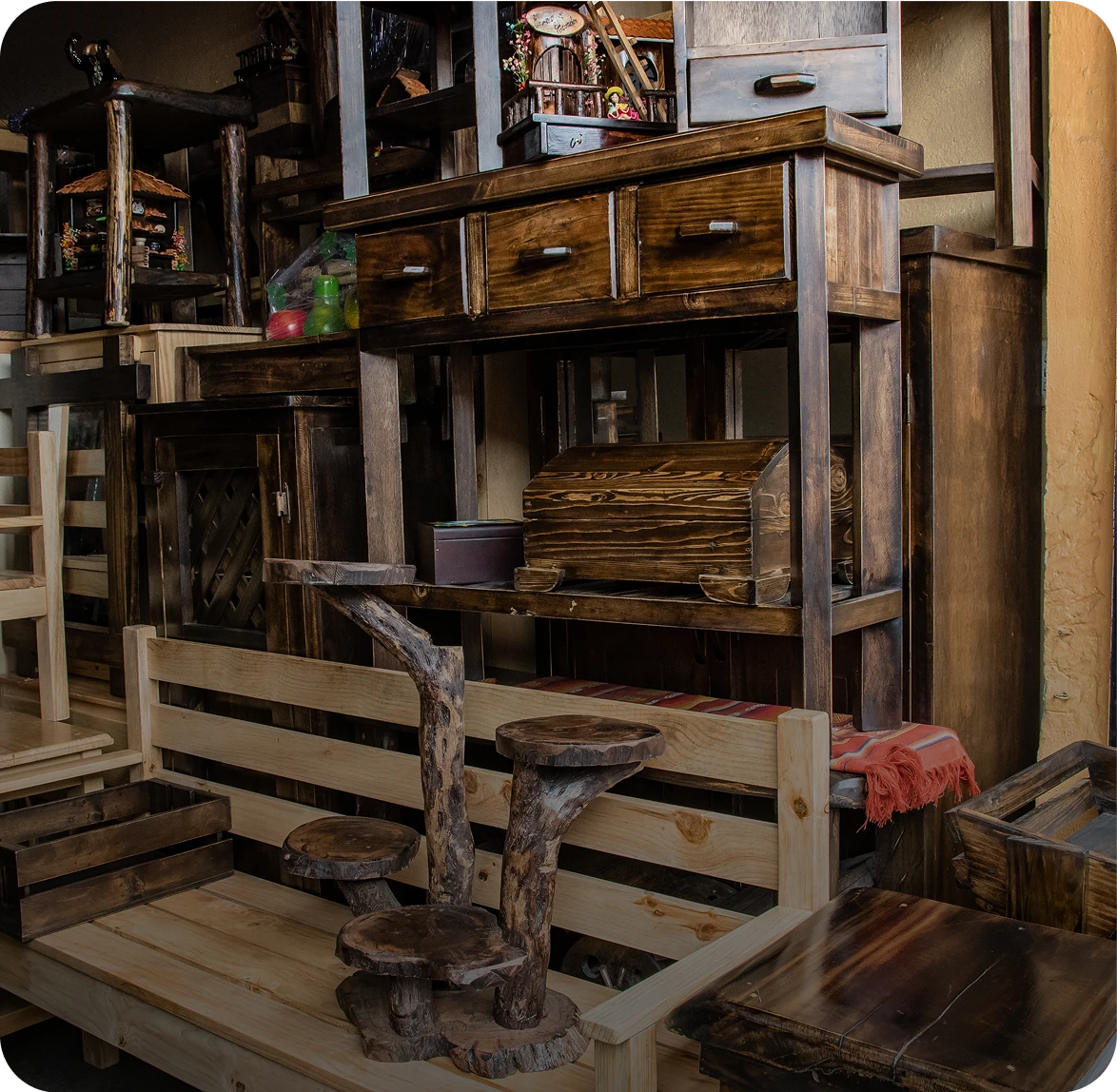 Wooden furniture displayed in a rustic setting.